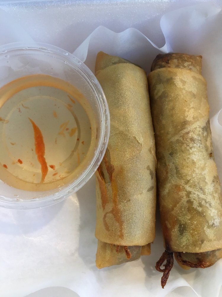 Golden fried spring rolls with dipping sauce